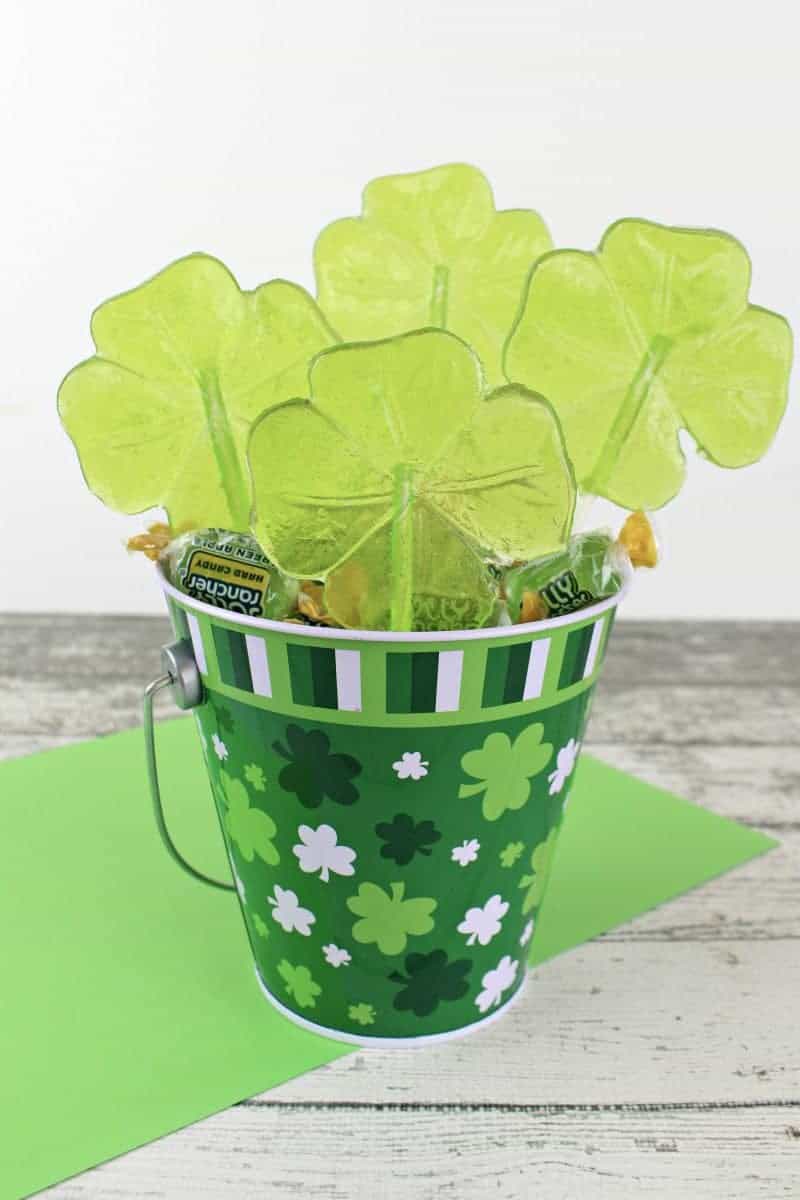 These beautiful green shamrock lollipops will make the perfect treat for your St. Patrick's Day party. You will not believe how easy they are to make!
