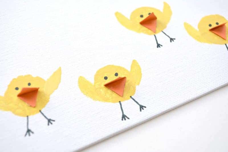 Are you looking for a fun Easter chicks craft idea? This cute baby chicks kids art project is made by stamping wine corks into yellow paint. It’s the perfect kids activity for the rainy (or even snowy) days leading up to Easter.