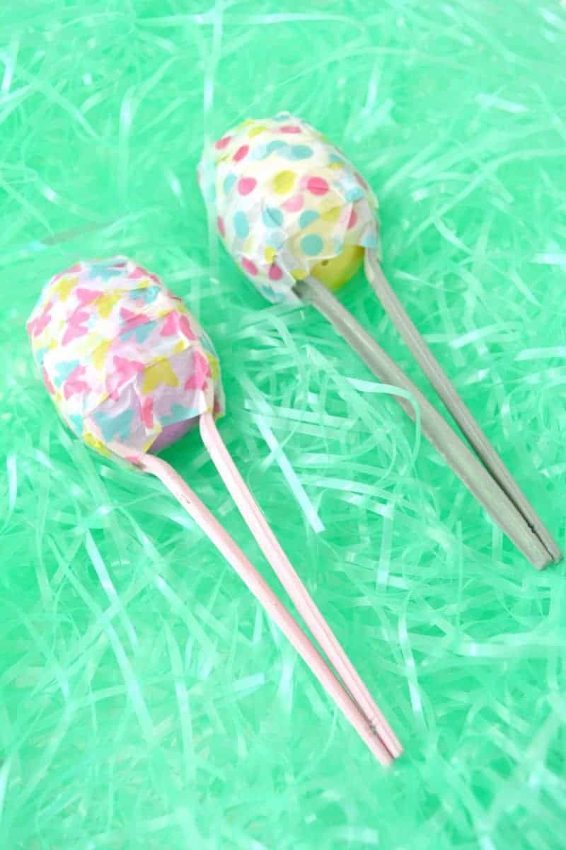 Easter egg maracas are a fun DIY instrument for toddler and preschoolers. They are easy to make using plastic eggs, plastic spoons, washi tape, and rice or beans.