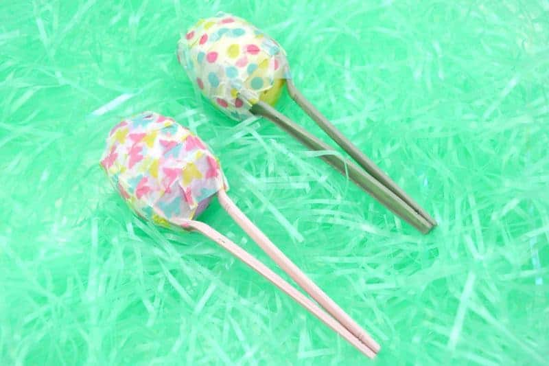 Easter egg maracas are a fun DIY instrument for toddler and preschoolers. They are easy to make using plastic eggs, plastic spoons, washi tape, and rice or beans. 