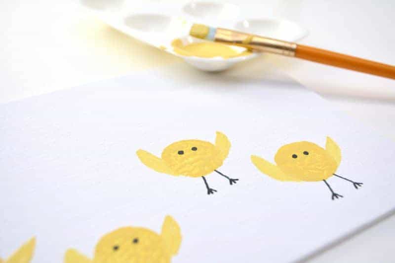 Are you looking for a fun Easter chicks craft idea? This cute baby chicks kids art project is made by stamping wine corks into yellow paint. It’s the perfect kids activity for the rainy (or even snowy) days leading up to Easter.