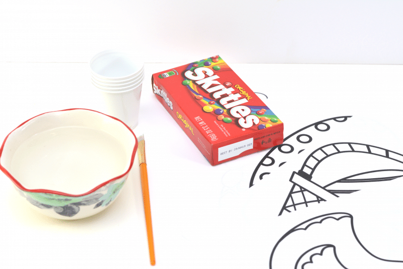 Looking for a fun Easter kids activity?! How about making 2-ingredient watercolor paint with Skittles candies?! See how to make skittles paints and download a free printable Easter egg coloring page.