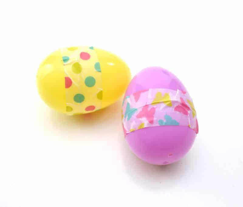 Easter egg maracas are a fun DIY instrument for toddler and preschoolers. They are easy to make using plastic eggs, plastic spoons, washi tape, and rice or beans. 