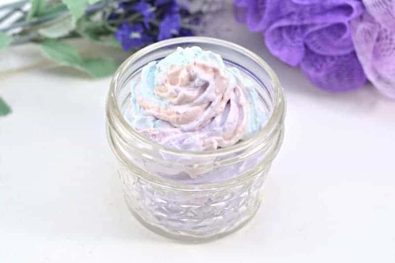 An easy DIY recipe for a magical unicorn whipped body butter made using shea butter, coconut oil, mica powder, and essential oils. In addition to being beautiful, this rainbow unicorn homemade body butter is rich, creamy, and moisturizing as well.