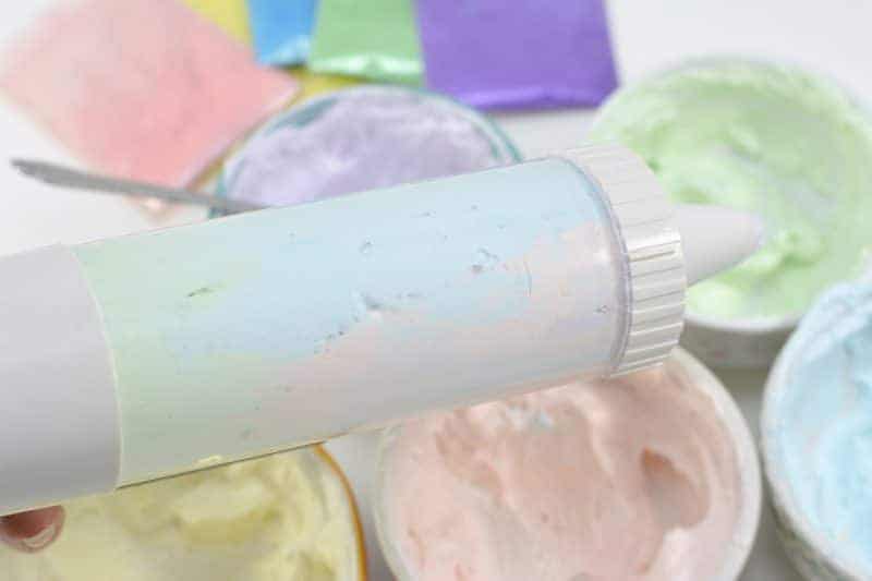 An easy DIY recipe for a magical unicorn whipped body butter made using shea butter, coconut oil, mica powder, and essential oils. In addition to being beautiful, this rainbow unicorn homemade body butter is rich, creamy, and moisturizing as well.