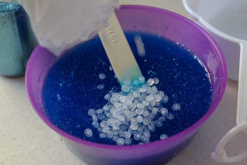 This blue and glittery, borax-free, under the sea ocean slime is a fun DIY sensory activity perfect for the summer months. 