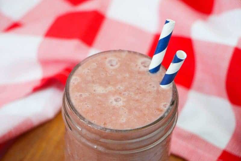Delicious pineapple cherry smoothie recipe made with frozen pineapple, cherries, kale, almond milk, yogurt, and vanilla extract. A tasty and refreshing treat for kids or grown-ups!