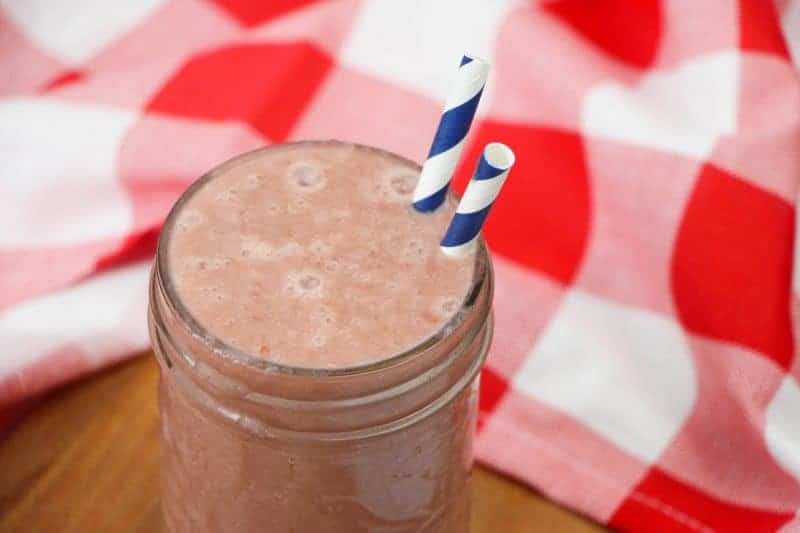 Delicious pineapple cherry smoothie recipe made with frozen pineapple, cherries, kale, almond milk, yogurt, and vanilla extract. A tasty and refreshing treat for kids or grown-ups!