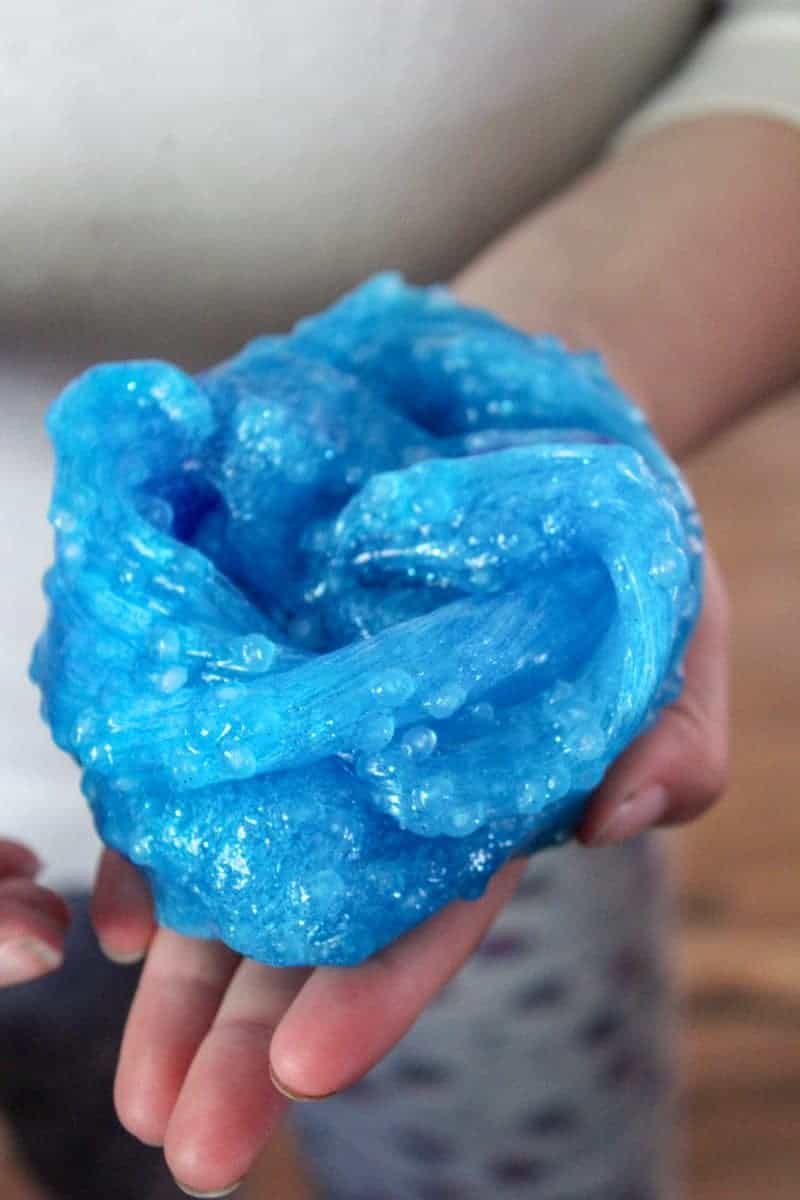 This blue and glittery, borax-free, under the sea ocean slime is a fun DIY sensory activity perfect for the summer months. 