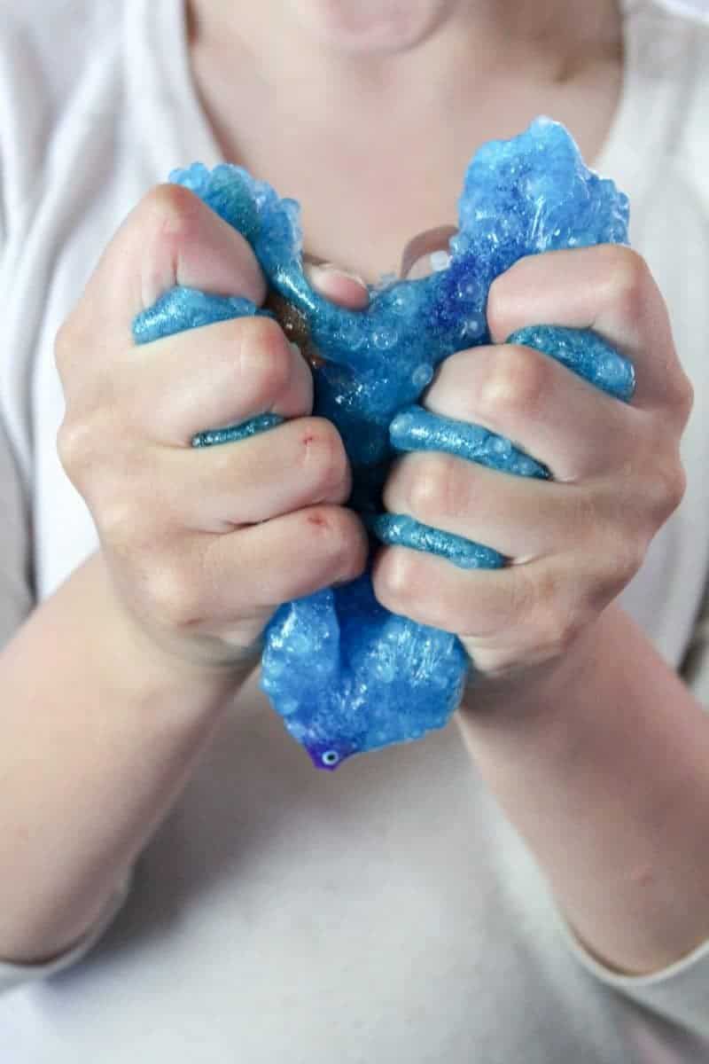 This blue and glittery, borax-free, under the sea ocean slime is a fun DIY sensory activity perfect for the summer months. 