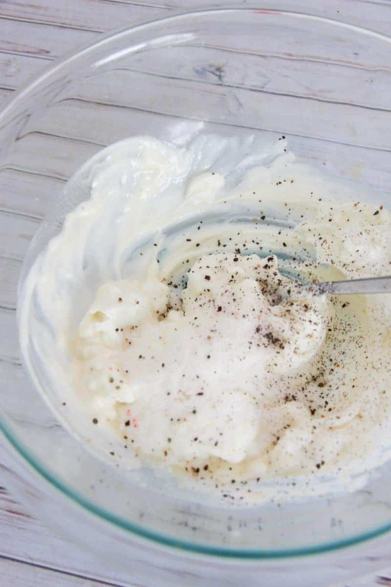 An easy, guilt-free, creamy no mayo coleslaw recipe that makes a great healthy side dish for summer barbecues. 