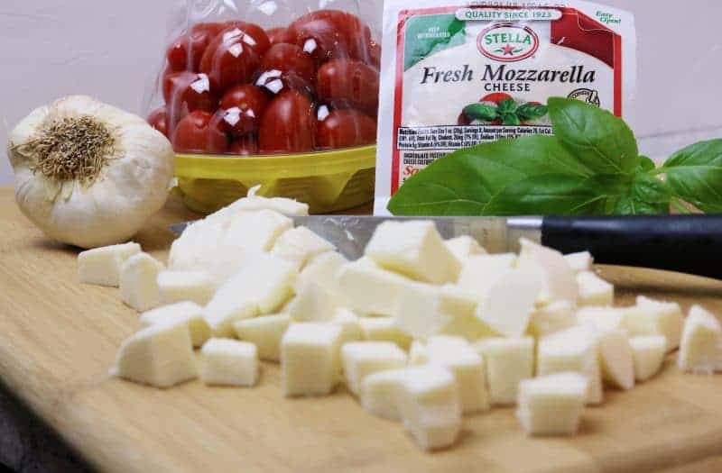 Made with fresh mozzarella, tomatoes, and basil; and tossed in a balsamic vinaigrette, this Caprese Pasta Salad recipe makes the perfect summer side dish. It is quick and easy to make, and great for barbecues, potlucks, or an easy summer lunch.