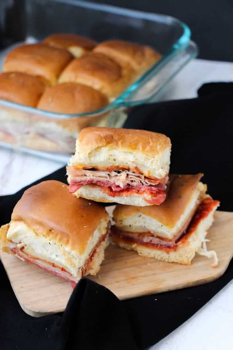 Italian sub sliders on Hawaiian Rolls with Italian meats and cheese.