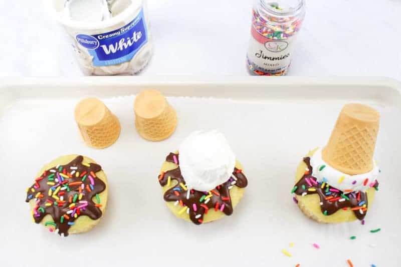 Melting ice cream cone cupcakes are easy to make and designed to look like a ice cream cone that fell upside down and is beginning to melt.