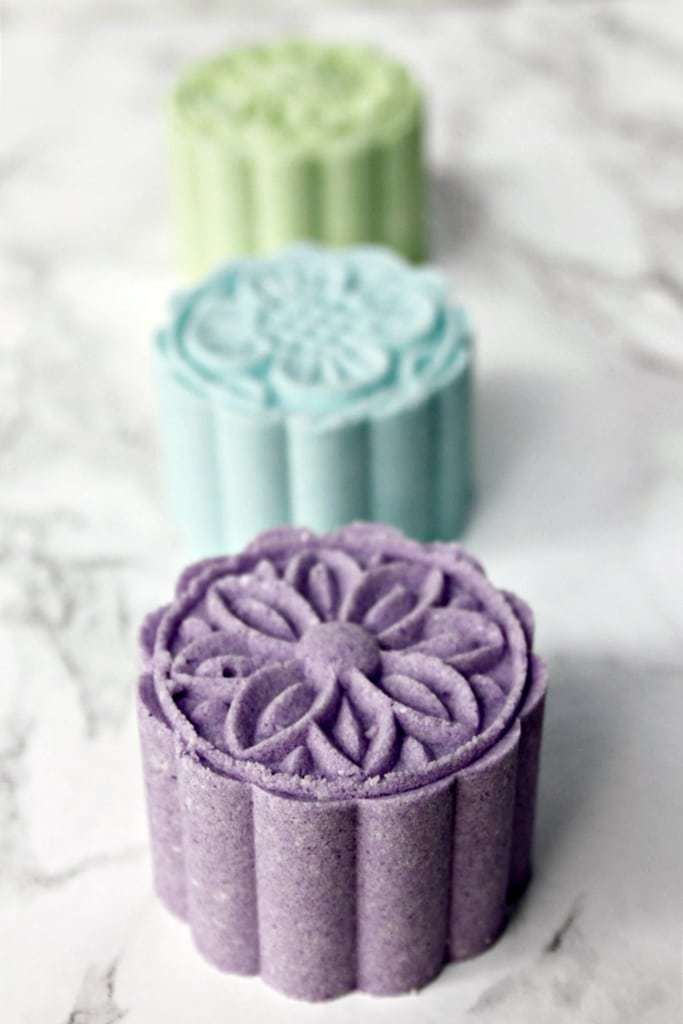 Learn how to make beautiful homemade bath bombs easily using a moon cake press.