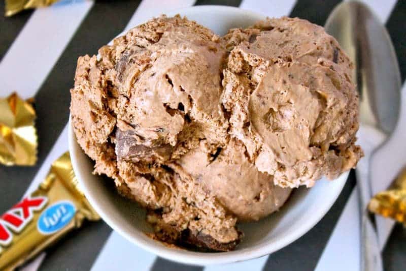 Creamy homemade chocolate twix ice cream is an easy to make indulging frozen treat perfect for summer or anytime of the year.