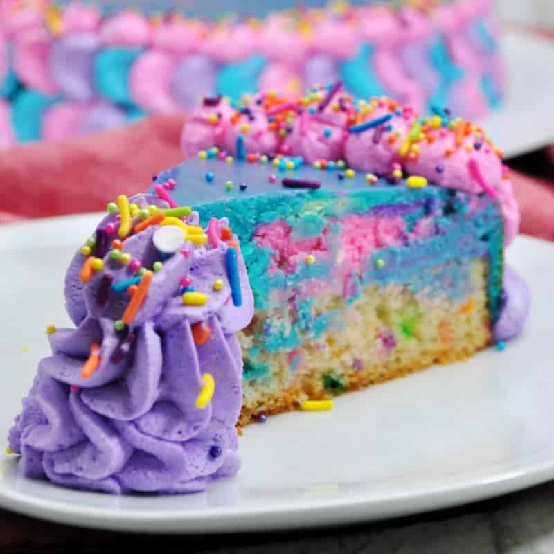 This unicorn cheesecake not only looks magical, but it tastes magical too. This funfetti-cheesecake combo is the perfect cake for a unicorn themed party!