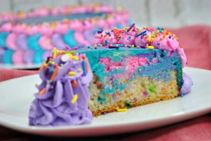 This unicorn cheesecake not only looks magical, but it tastes magical too. This funfetti-cheesecake combo is the perfect cake for a unicorn themed party!