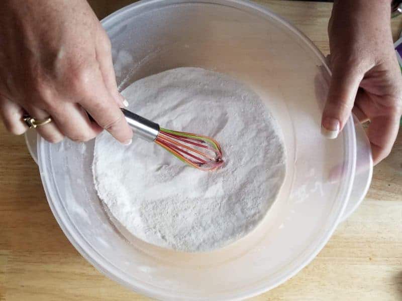 Use whisk to break down lumps