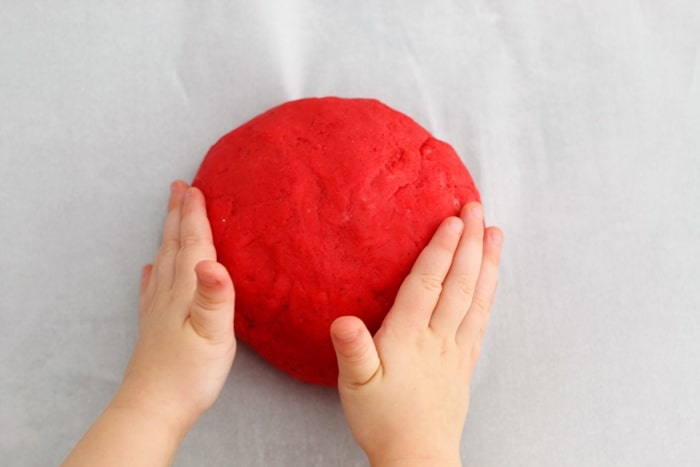 A non-toxic, taste-safe, apple scented playdough recipe perfect for Fall sensory play at home or in the classroom.