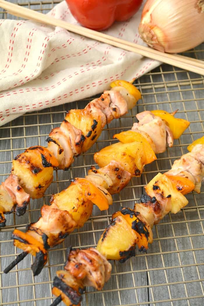 Grilled pineapple chicken skewers with a sweet and tangy polynesian glaze are a perfect for an easy family dinner option or for serving at your next BBQ.