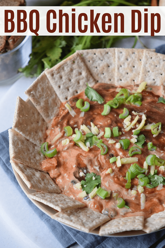 A BBQ chicken dip made with shredded chicken, cream cheese, sour cream, BBQ sauce, and cheese. This BBQ dip makes a great party appetizer or game day snack.