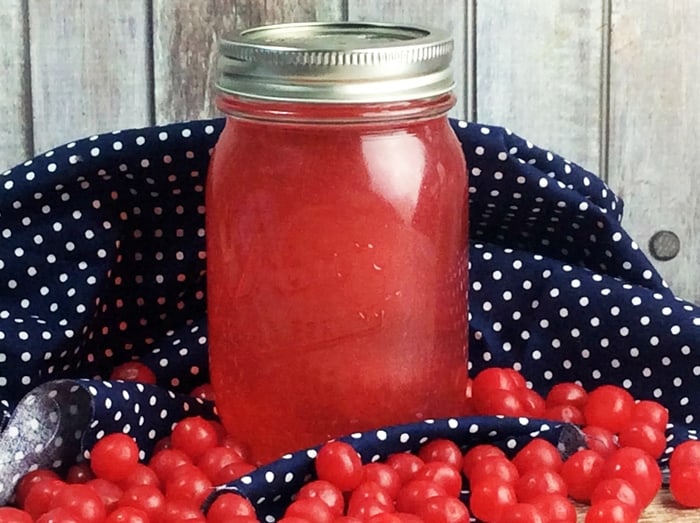 Sour cherry moonshine -- a sweet, puckering homemade moonshine made from infusing Everclear, cherry vodka, and sour cherry candies.