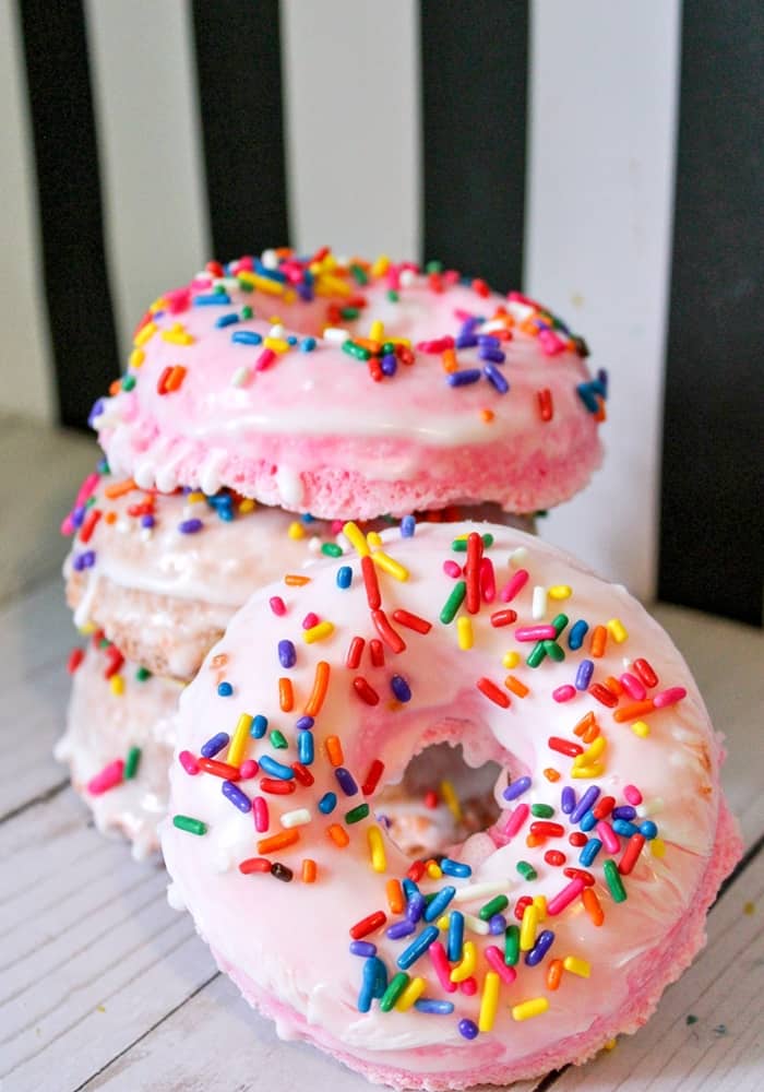 Colorful doughnut bath bombs are a fun DIY gift idea, perfect for a relaxing at-home spa day for the donut-lover in your life!