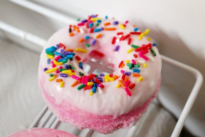 Colorful doughnut bath bombs are a fun DIY gift idea, perfect for a relaxing at-home spa day for the donut-lover in your life!