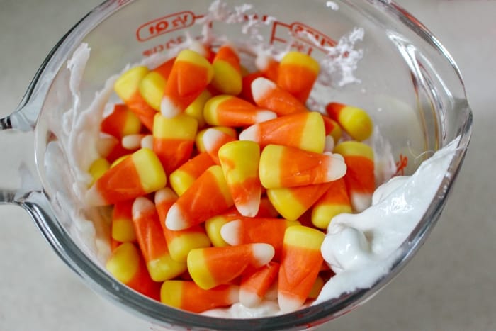 Celebrate Halloween with a batch of fun and taste-safe candy corn slime, made with actual candy corn!