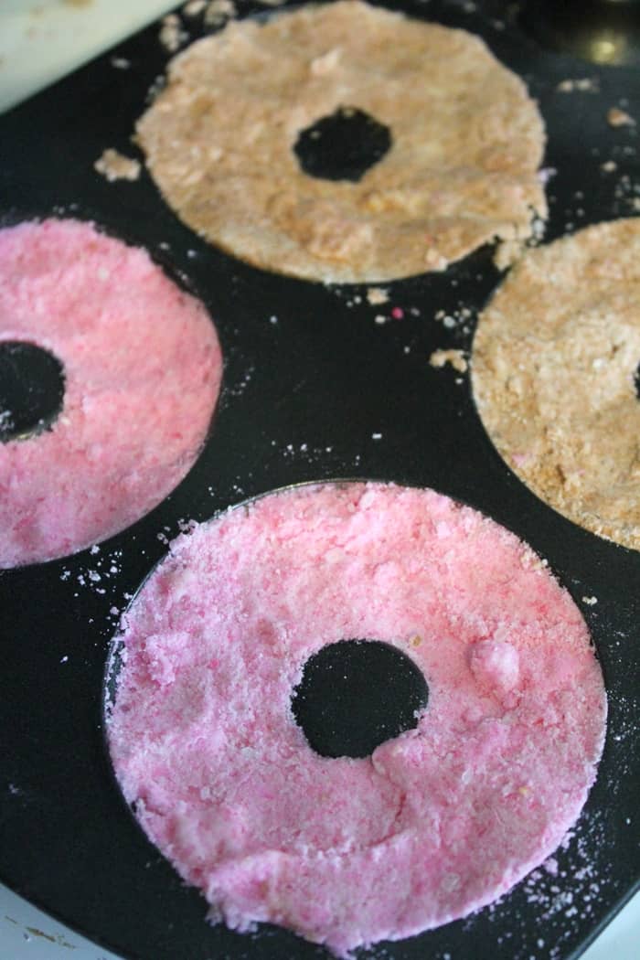 Colorful doughnut bath bombs are a fun DIY gift idea, perfect for a relaxing at-home spa day for the donut-lover in your life!