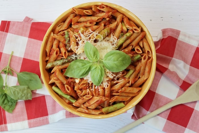 Whole wheat pasta with asparagus and marinara sauce is a quick and easy weeknight dinner option that the whole family will enjoy.