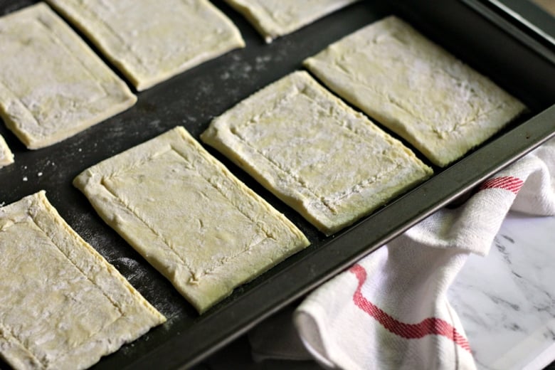 score a border around each puff pastry