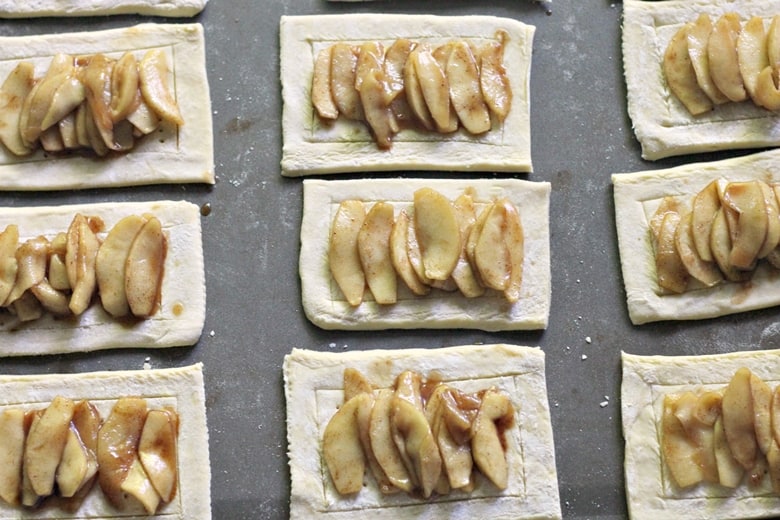 An apple danish recipe with a delicious crumb topping and drizzle of icing. This tasty apple crumb danish makes for a sweet breakfast or brunch option.