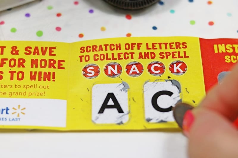 Scratching Collect to Win letters