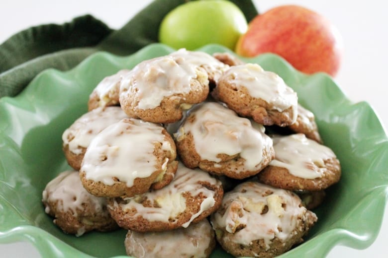 These soft apple cookies combine tender pieces of apple, crunchy bits of toasted pecans, and a sweet glaze for a completely irresistible Fall dessert. 