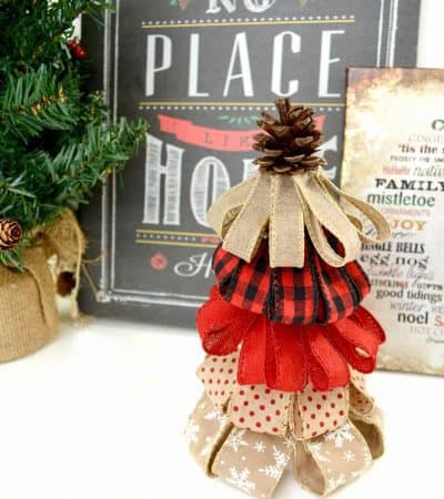 If you love rustic décor, you will absolutely adore this burlap ribbon Christmas tree craft. They are perfect for holiday decor or holiday gifting!