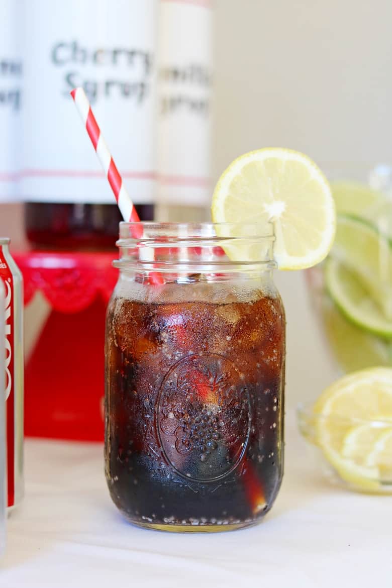 Set up a flavored soda station for your holiday party with these beverage station tips and free printable soda station sign and syrup bottle labels.