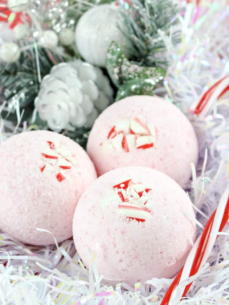 Treat yourself to a soothing and relaxing bath this holiday season with these easy and affordable homemade peppermint bath bombs. They also make a great DIY Christmas gift idea!