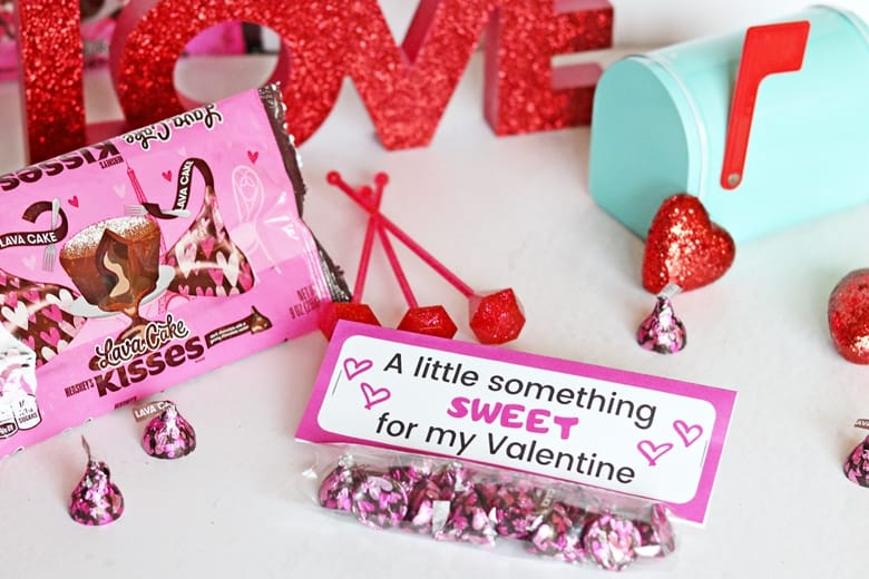 Use these free printable "A little something sweet" Valentine's Day treat bag toppers to make easy and affordable homemade Valentines.
