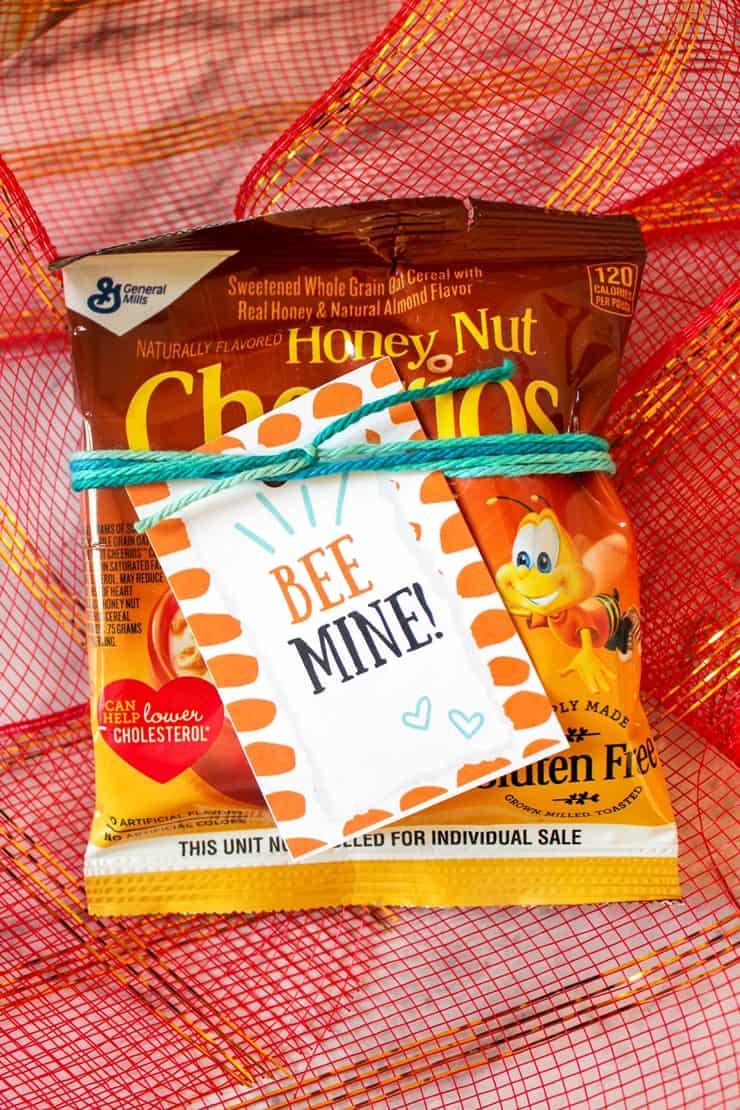 Bee Mine gift tag tied to a bag of Honey Nut Cheerios
