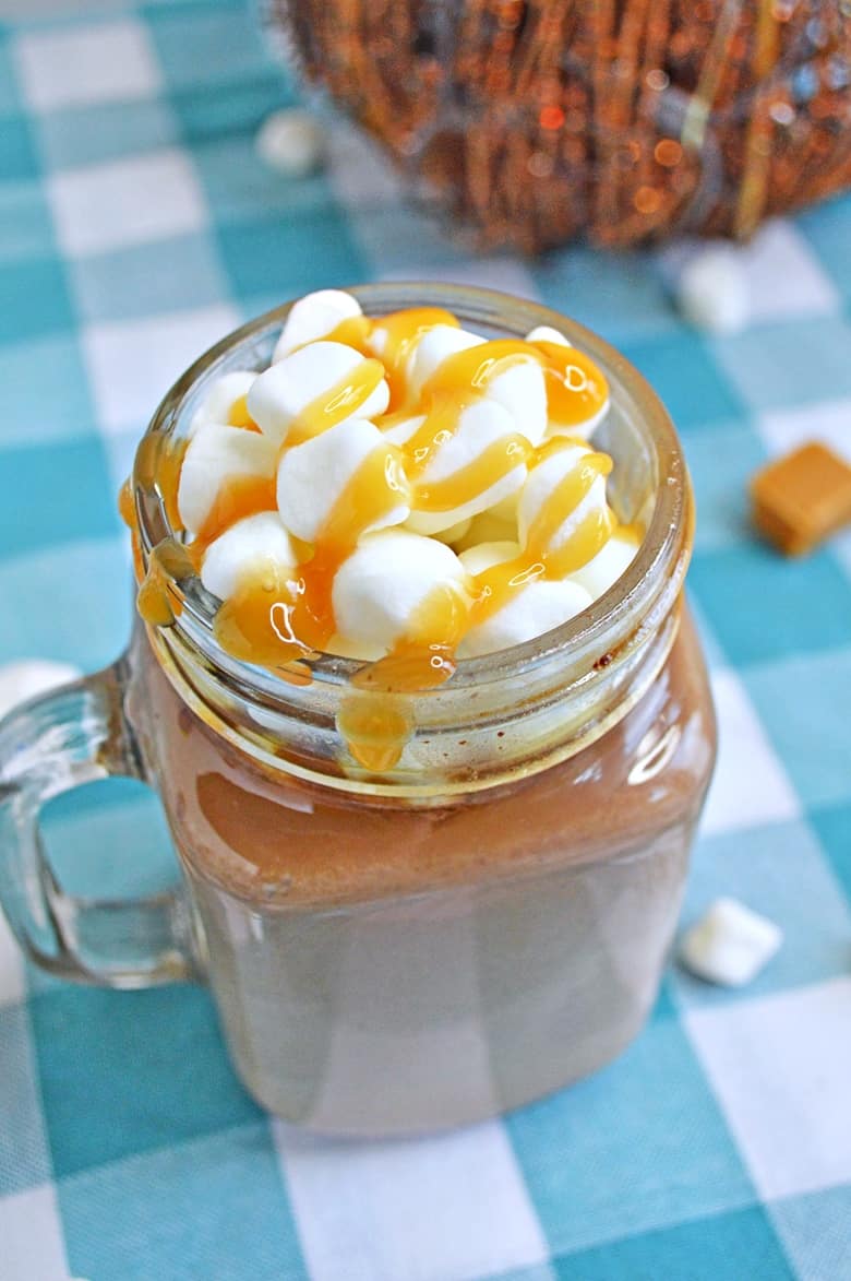 A rich and creamy salted caramel hot chocolate recipe that you can make easily right at home in your slow cooker.