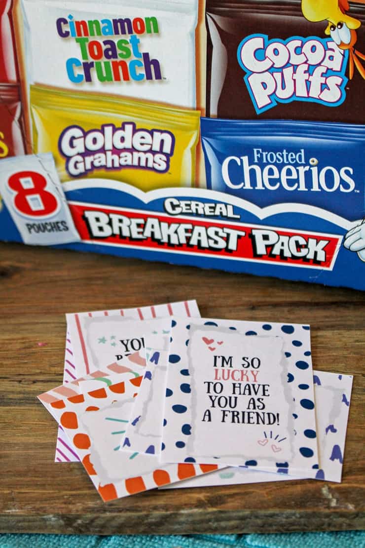 Printable Cereal Valentine Tags next to box of assorted cereals