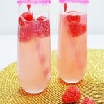 This small-batch Raspberry Lemonade Mimosa recipe made with champagne and raspberry lemonade is a perfect cocktail for brunch with the girls.