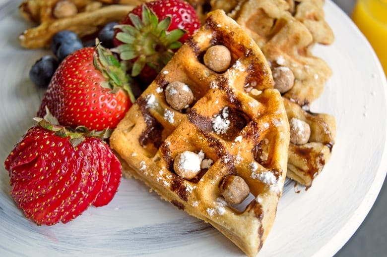 Combine two breakfast favorites -- cereal and waffles -- with this rich and peanut-buttery Reese's Puffs cereal waffles recipe.