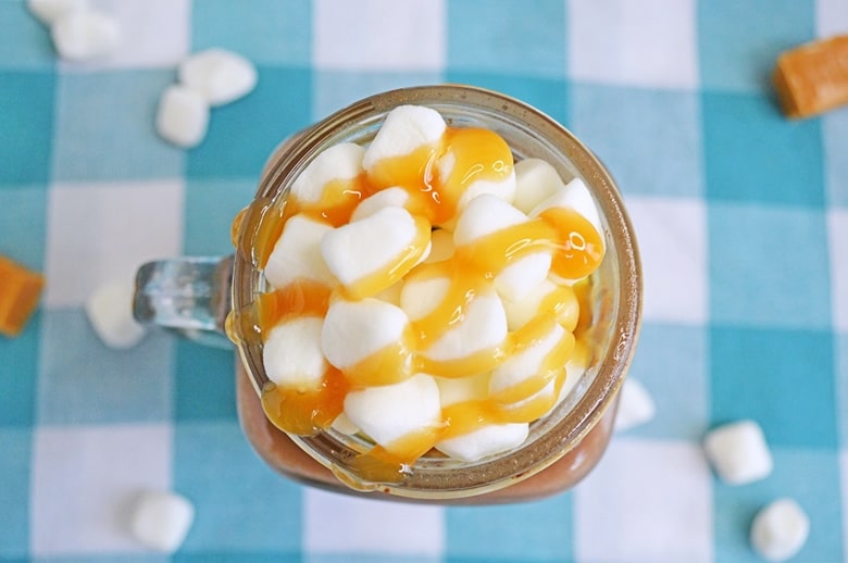 A rich and creamy salted caramel hot chocolate recipe that you can make easily right at home in your slow cooker.