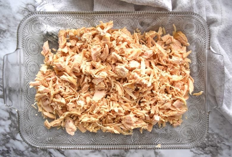 Shredded chicken in casserole dish