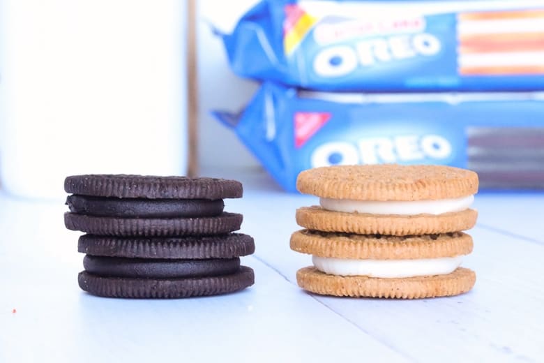 OREO Dark Chocolate and OREO Carrot Cake Cookies stacked with packaging in background