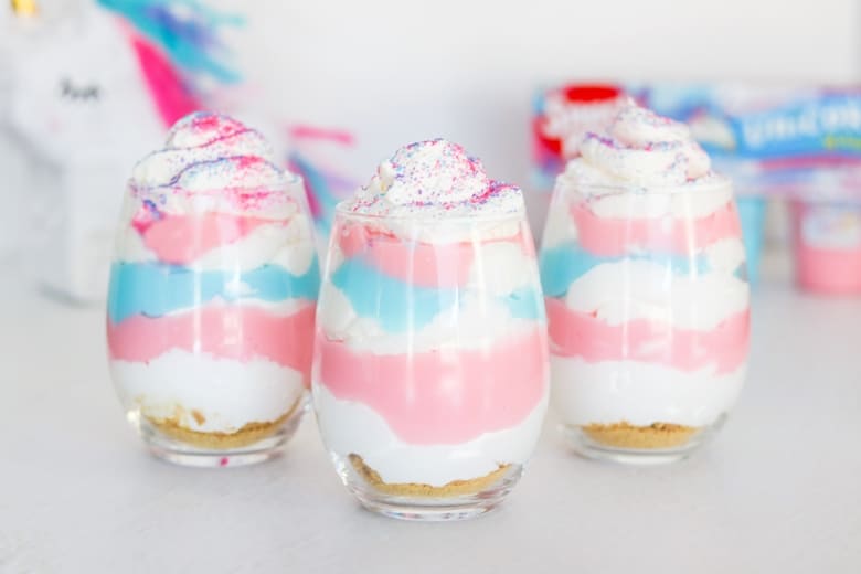 Unicorn pudding parfaits, made with Limited Edition Unicorn Magic Snack Packs, are an easy no-bake dessert perfect for unicorn lovers and unicorn parties.