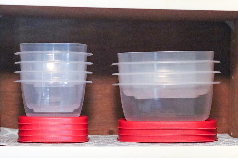 Easy Find Lids containers empty and stacked in cabinet